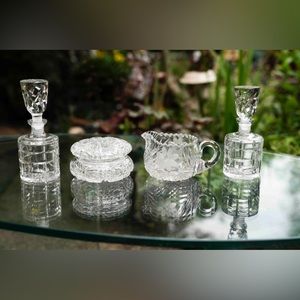 Clear vintage cut glass. Sugar, creamer and cruets. Brand new!!